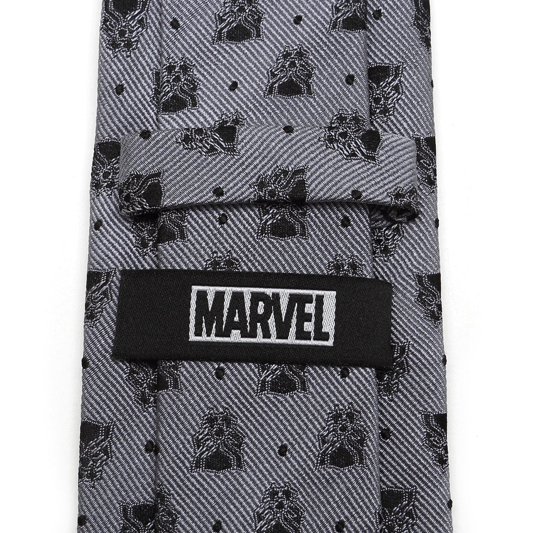 Marvel Black Panther Gray Dot Tie in gray silk, featuring a repeating black pattern of the Black Panther mask and small dots, with a black Marvel label on the back.