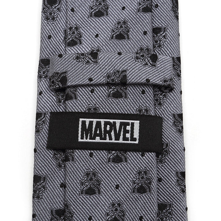 Marvel Black Panther Gray Dot Tie in gray silk, featuring a repeating black pattern of the Black Panther mask and small dots, with a black Marvel label on the back.