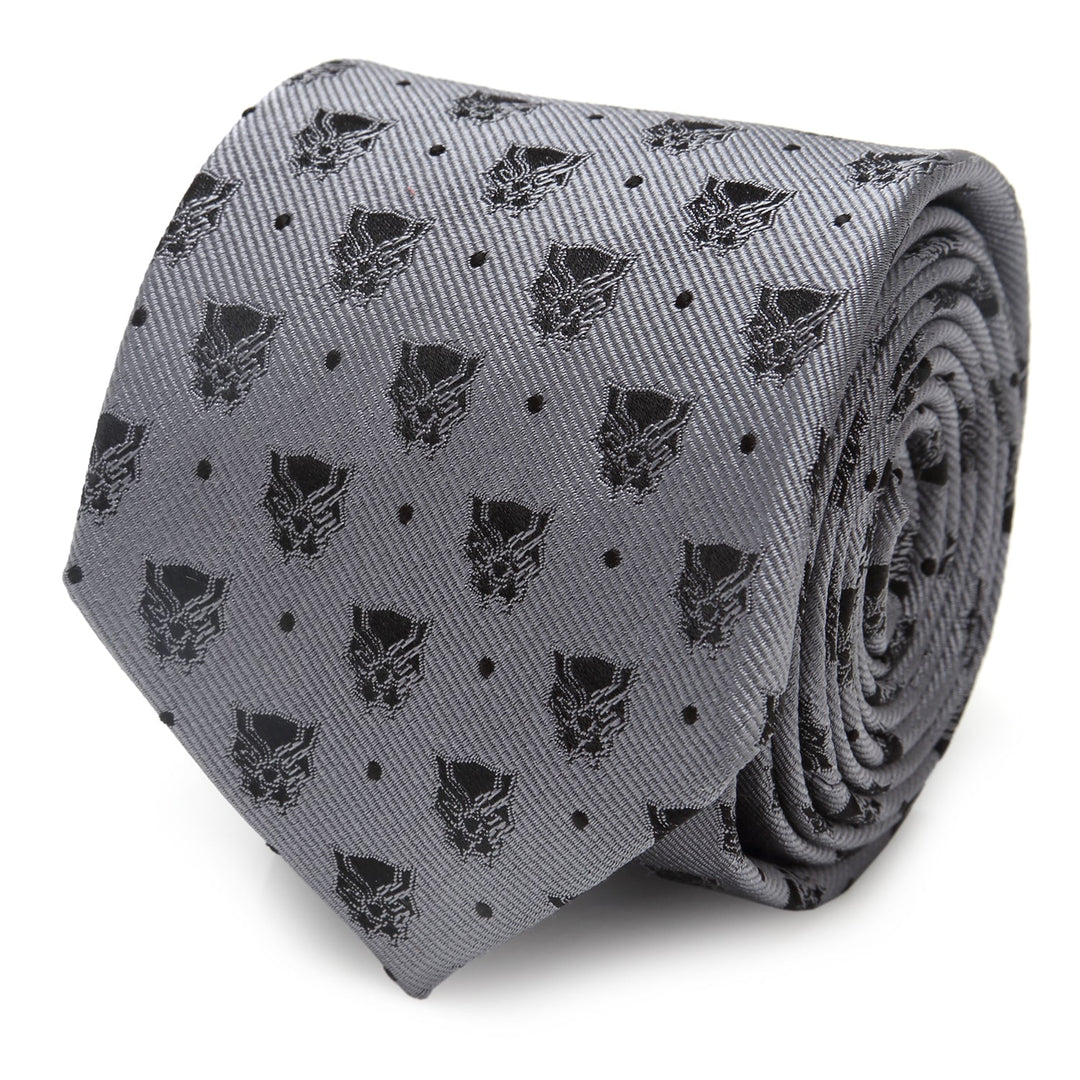 Rolled-up gray silk Marvel Black Panther Gray Dot Tie featuring a repeating pattern of black Panther masks and small dots.
