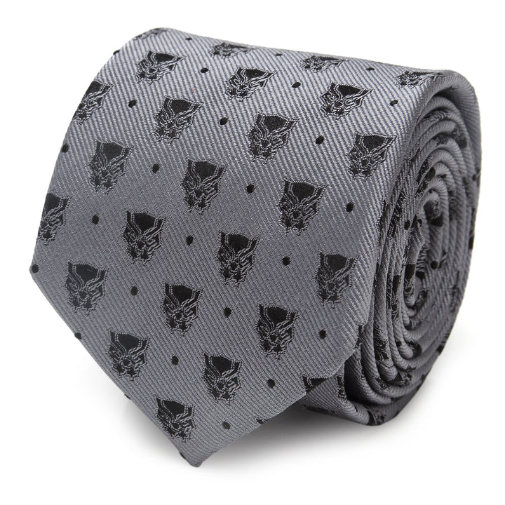 Rolled-up gray silk Marvel Black Panther Gray Dot Tie featuring a repeating pattern of black Panther masks and small dots.