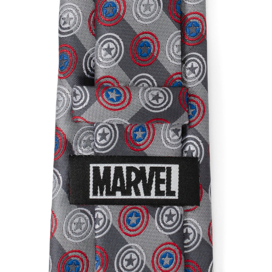 Marvel Captain America Gray Stripe Men’s Tie in gray with a diagonal stripe pattern, repeating shield motif, and a black Marvel logo tag on the back loop.