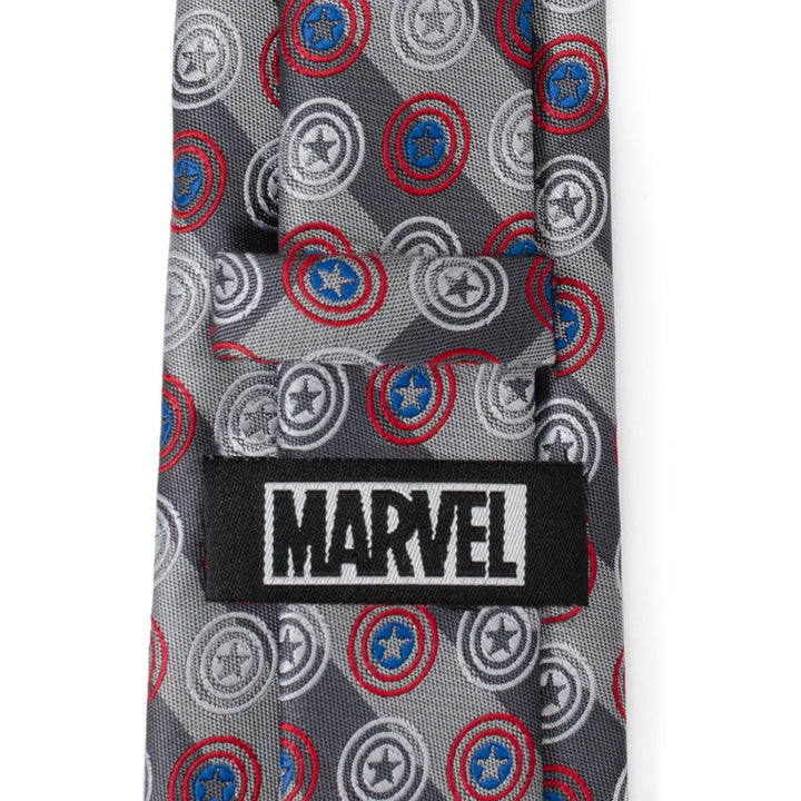 Marvel Captain America Gray Stripe Men’s Tie in gray with a diagonal stripe pattern, repeating shield motif, and a black Marvel logo tag on the back loop.