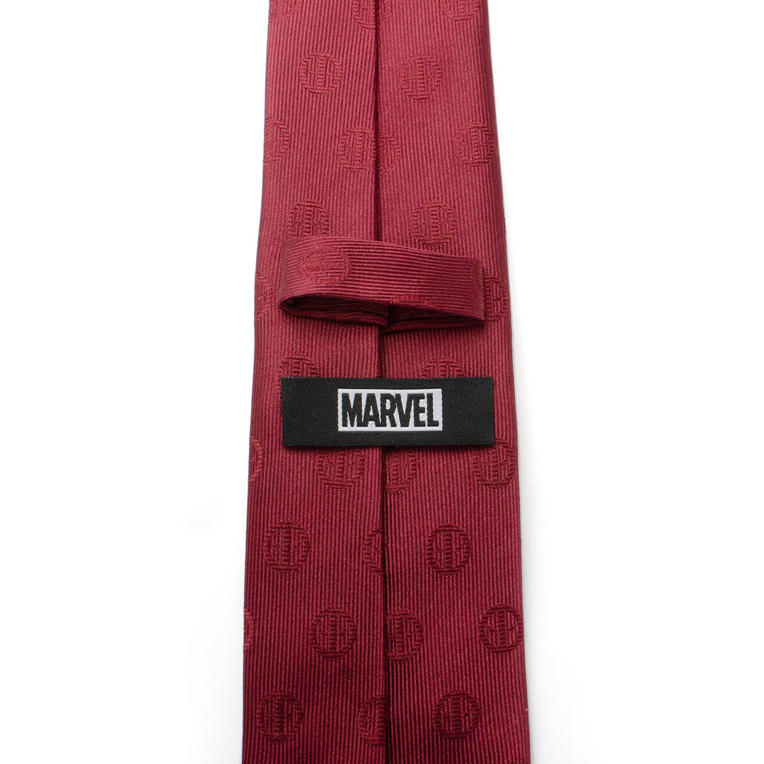 Marvel Deadpool Maroon Men’s Tie in maroon with a repeating mask pattern and an officially licensed Marvel logo tag on the back.