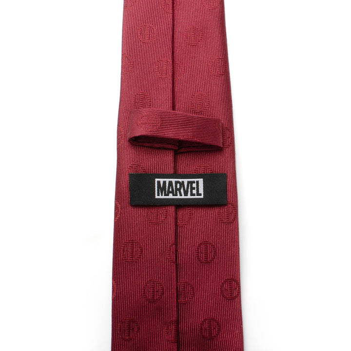 Marvel Deadpool Maroon Men’s Tie in maroon with a repeating mask pattern and an officially licensed Marvel logo tag on the back.