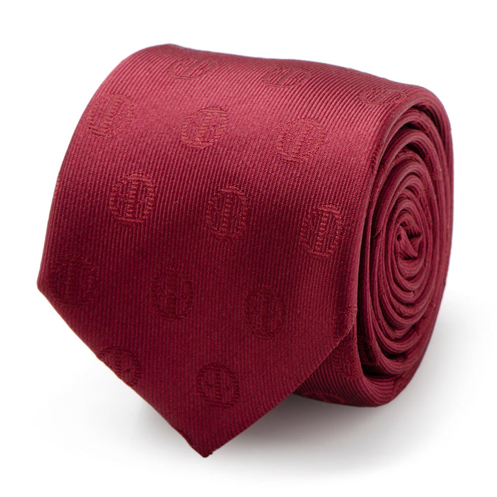 A rolled-up Marvel Deadpool Maroon Men’s Tie in maroon, featuring a repeating circular logo pattern.