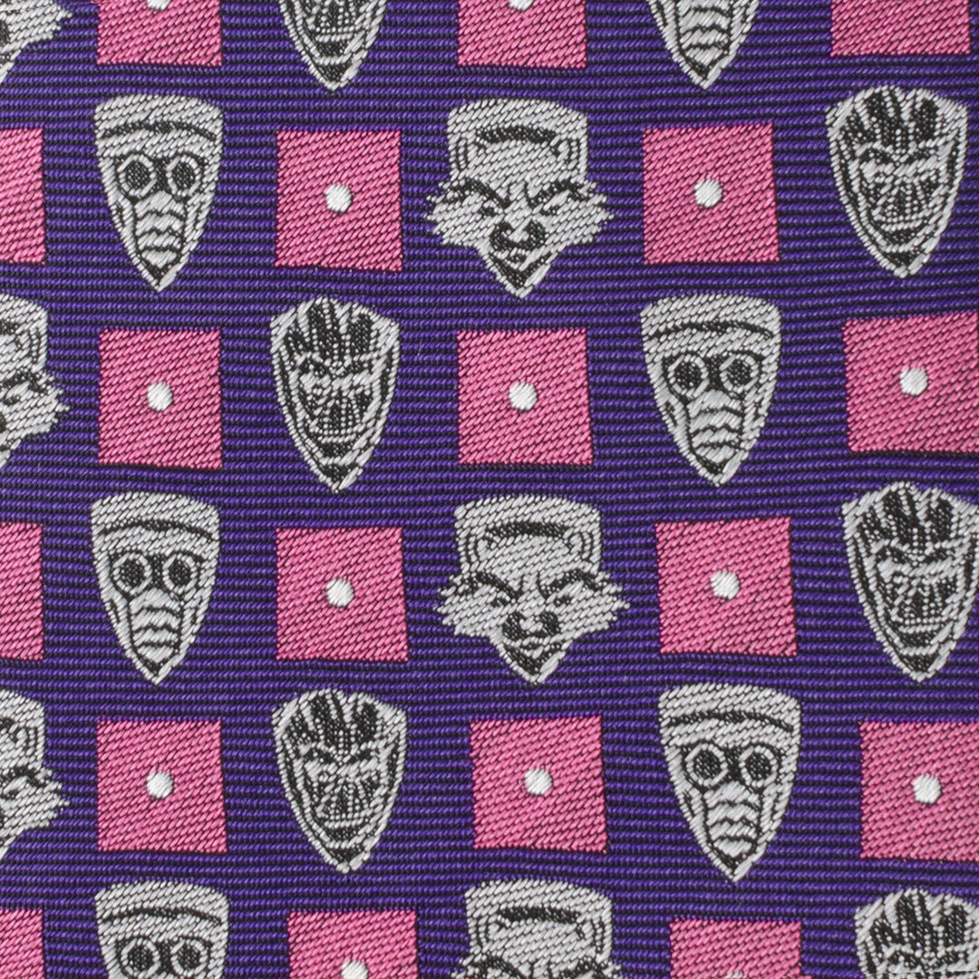 Marvel Guardian’s of the Galaxy Purple Men’s Tie in silk, featuring a repeating pattern of white comic book character masks, pink squares, and white dots.