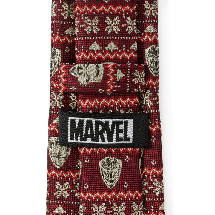 Marvel Guardians of the Galaxy Fair Isle Red Men’s Tie with a pattern of small character mask icons and a Cufflinks.com brand label on the back.