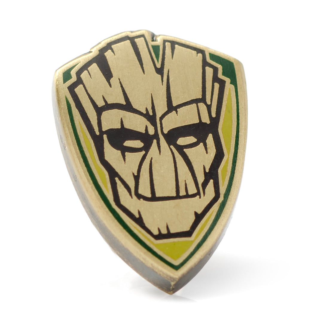 Marvel Guardians of the Galaxy Groot Lapel Pin shaped like a shield, featuring a stylized, etched face of a tree-like character with green and yellow accents.