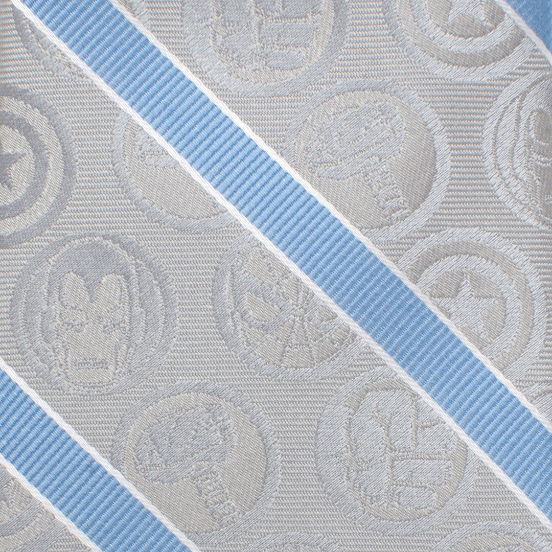 Marvel Comics Gray and Blue Stripe Men’s Tie in gray silk with diagonal light blue stripes and a repeating pattern of Marvel superhero emblems.