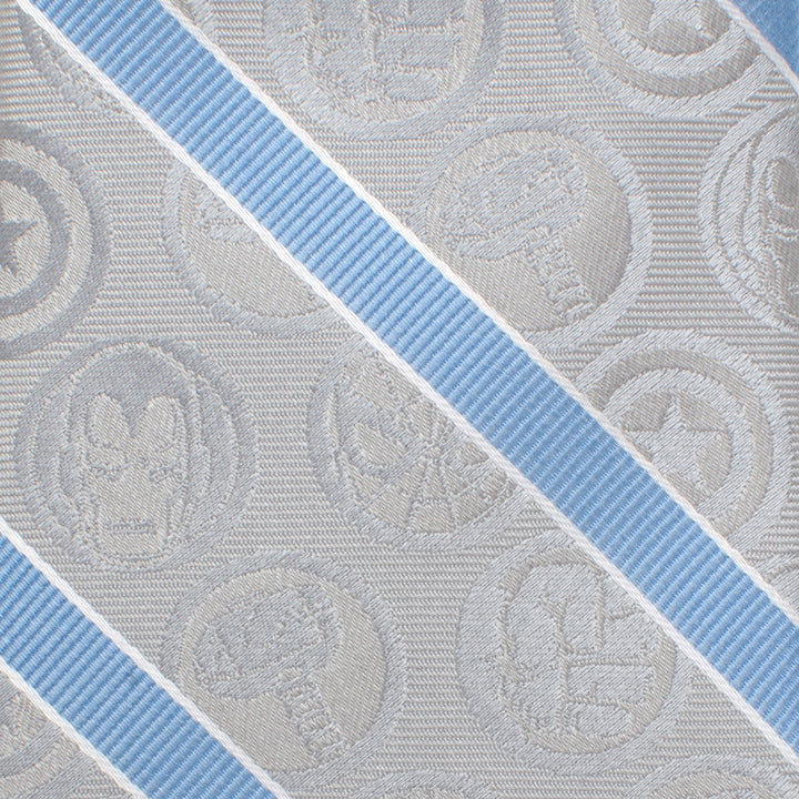 Marvel Comics Gray and Blue Stripe Men’s Tie in gray silk with diagonal light blue stripes and a repeating pattern of Marvel superhero emblems.