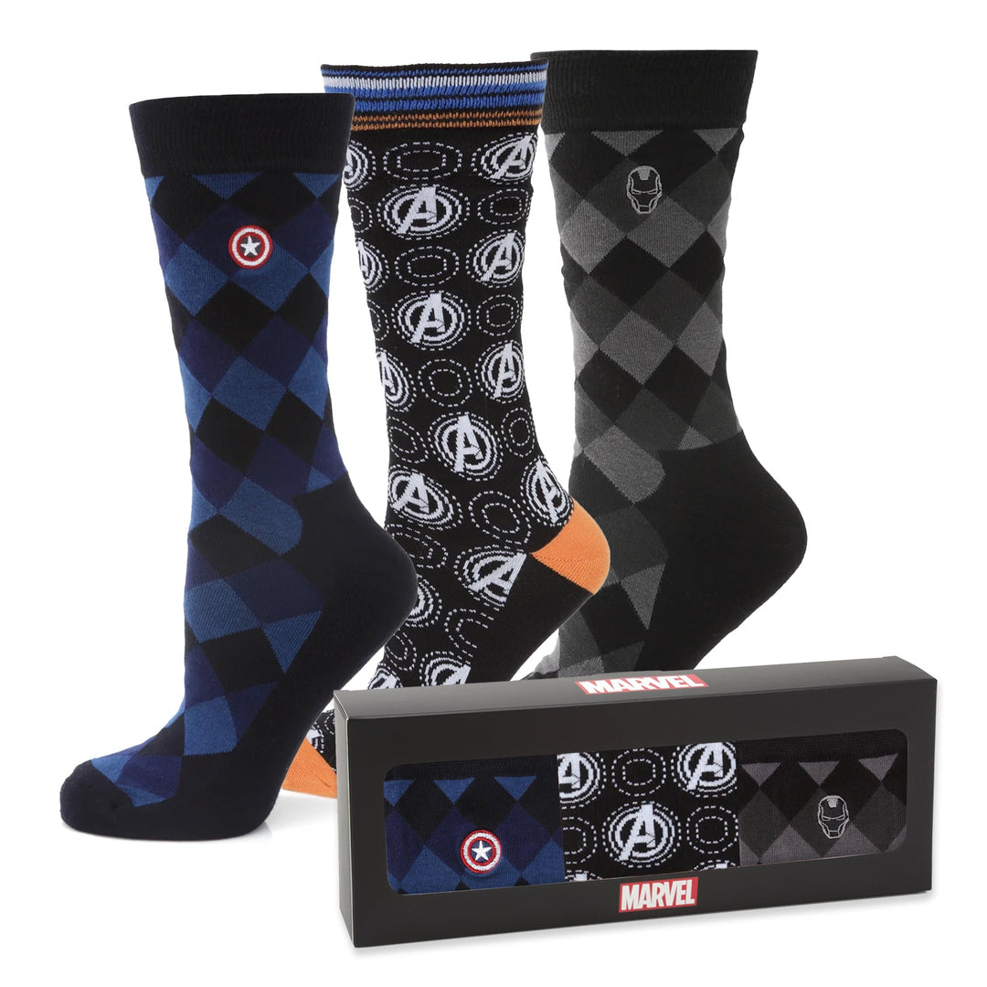 Marvel Argyle 3 Socks Pack and Lapel Pin Gift Set featuring three pairs of socks in blue, black, and grey displayed alongside their branded Avengers box.