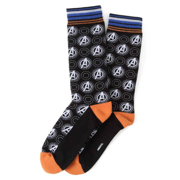 A pair of Marvel Argyle 3 Socks Pack and Lapel Pin Gift Set socks featuring an Avengers logo argyle pattern, orange heels and toes, and blue-striped cuffs.