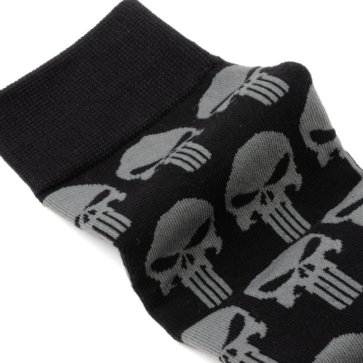 Marvel Punisher Black Socks and Silver Lapel Pin Gift Set featuring black crew socks with a repeating grey skull logo pattern.