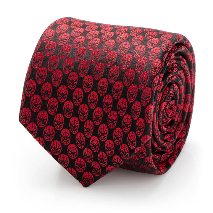 Marvel Spider-Man Mask Red Men’s Tie in crimson with a repeating black mask pattern, coiled on a white surface.
