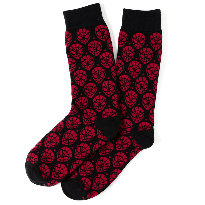 Two black Marvel Spider-Man Dot 3 Pack Socks and Lapel Pin Gift Set socks featuring a repeating red mask pattern.