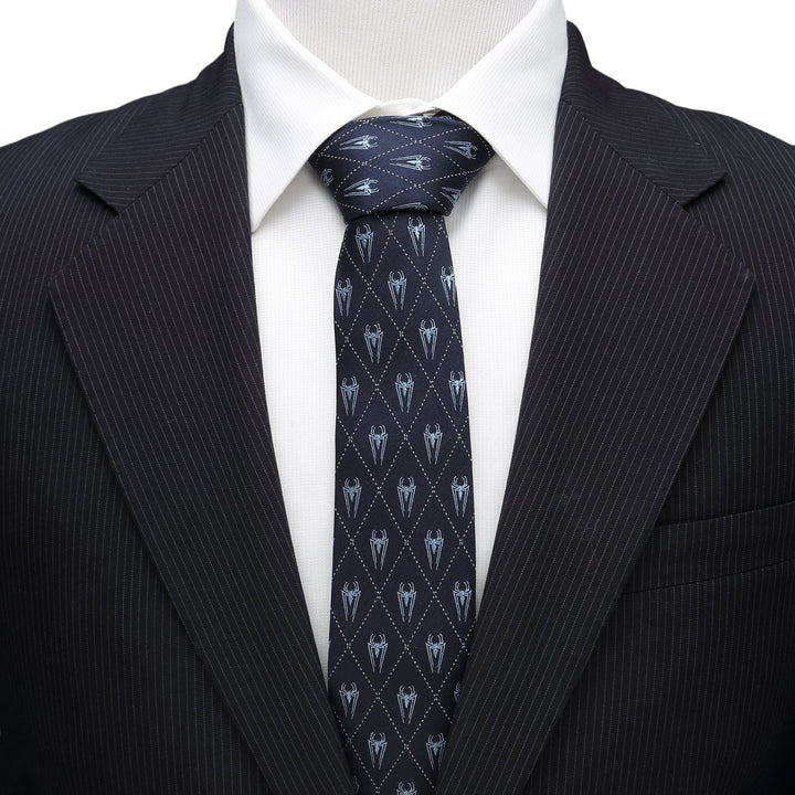 Marvel Spider-Man Diamond Navy Men’s Tie in navy blue silk with a white diamond grid pattern and small spider icons, worn with a white collared shirt and black pinstripe suit jacket.