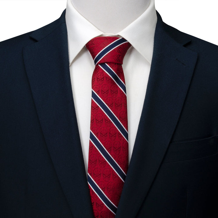 Marvel Spider-Man Red and Navy Stripe Men’s Tie in red silk with navy and white diagonal stripes and a subtle mask pattern, worn with a white shirt and navy blazer.