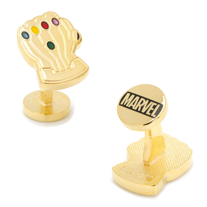 Marvel Thanos Infinity Gauntlet Cufflinks: one shaped like a gold-tone Infinity Gauntlet with colored stones, and the other a round gold-tone stud featuring the Marvel logo.