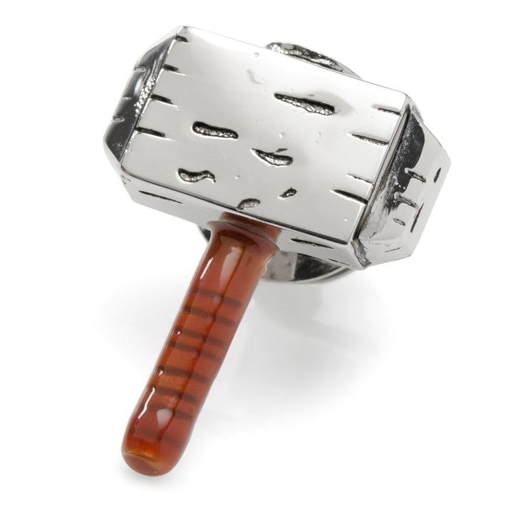 Marvel Thor Mjolnir Lapel Pin, a silver replica with a brown handle.