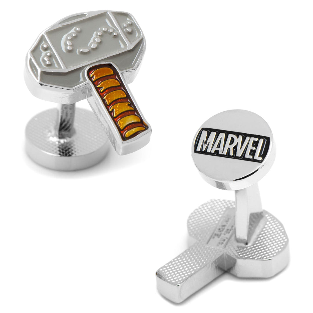 Marvel Thor Hammer Mjolnir Cufflinks, consisting of one Thor hammer-shaped cufflink and one round cufflink featuring the word “MARVEL” in black text.