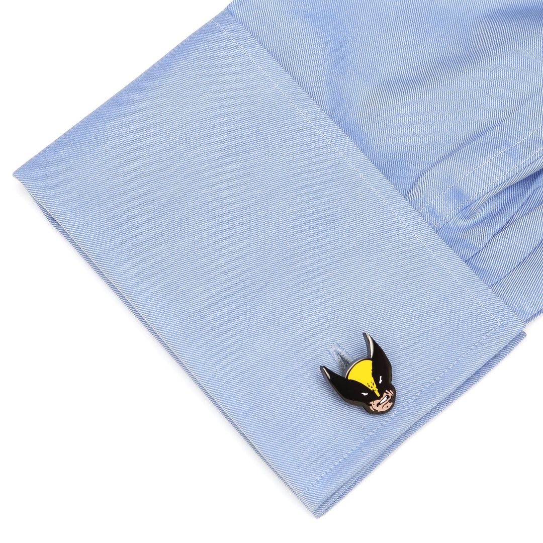 Marvel X-Men Wolverine Cufflinks attached to a blue French cuff shirt sleeve.