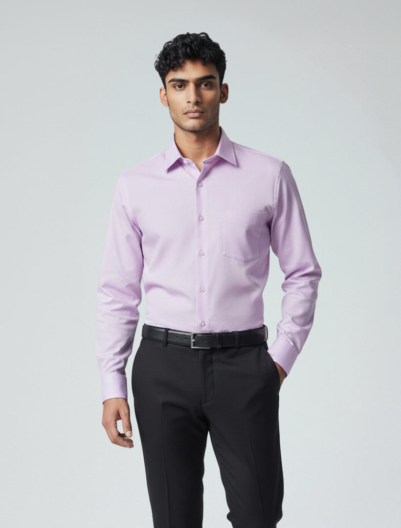 A man wears the Karako Men Lavender Dress Shirt, a stylish classic-fit option from Karako Men. Paired with black pants, it stands out against a plain light background and is machine washable for easy care.