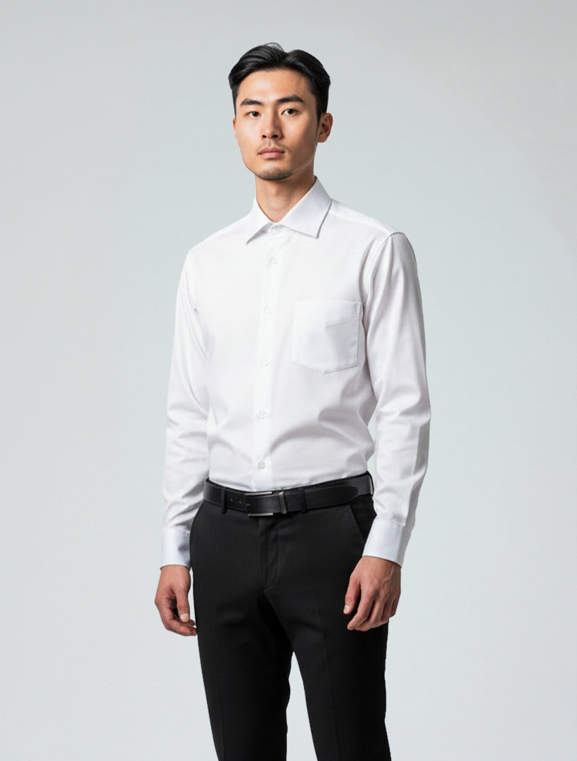 A man faces forward wearing a Karako Men White Dress Shirt and black trousers, set against a plain light background.