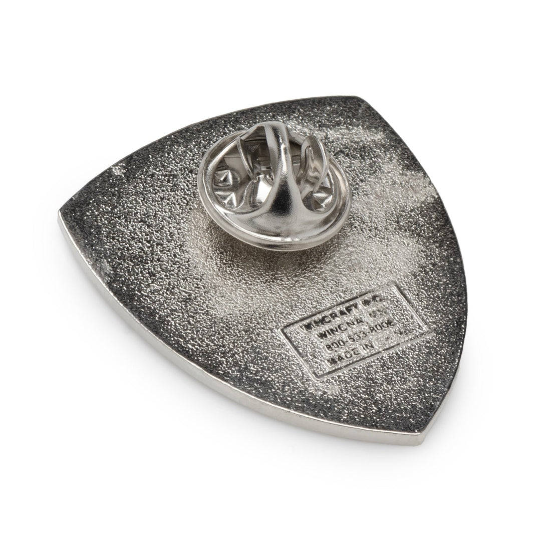 The back of an NFL Baltimore Ravens Shield Lapel Pin, featuring a butterfly clutch fastener and engraved manufacturer details.