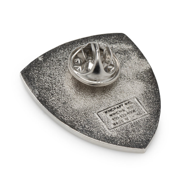 The back of an NFL Baltimore Ravens Shield Lapel Pin, featuring a butterfly clutch fastener and engraved manufacturer details.