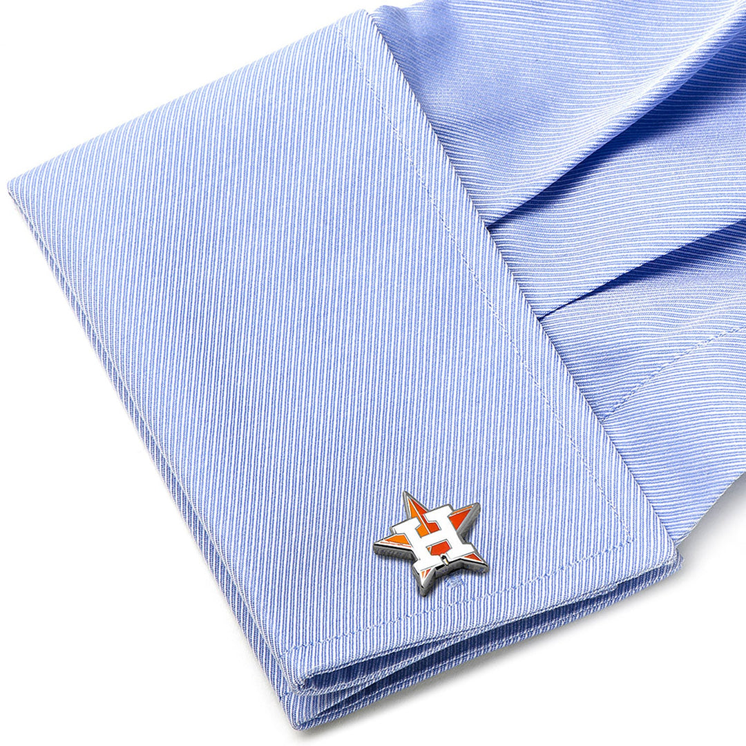 MLB Houston Astros Cufflinks featuring an orange and white H inside a silver star shape, fastened to a light blue dress shirt cuff.