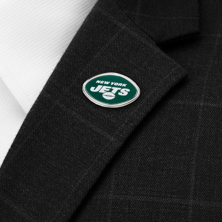 Oval NFL New York Jets Lapel Pin attached to a dark suit jacket.