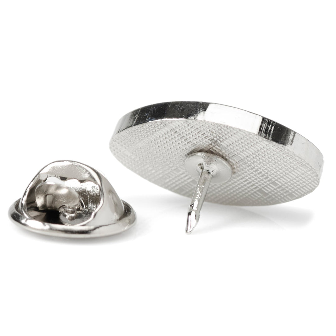 The back of an NFL New York Jets Lapel Pin shown with its detached clutch fastener.