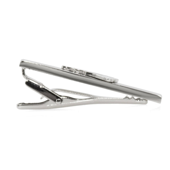 Side view of a silver-tone metal New England Patriots Tie Clip featuring an emblem on one end.