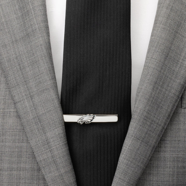 Silver-tone NFL Philadelphia Eagles Tie Clip worn on a black tie and grey suit jacket.