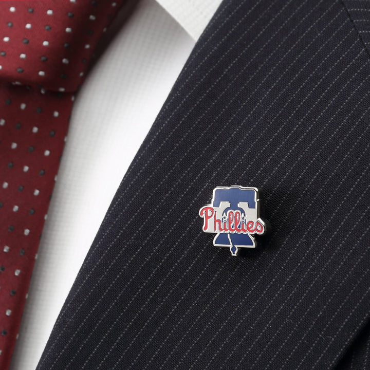 An MLB Philadelphia Phillies Lapel Pin attached to a navy pinstripe suit lapel.