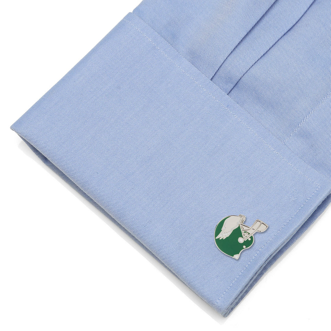 NFL Philadelphia Eagles Retro Helmet Cufflinks in a green and white helmet shape on a light blue dress shirt cuff.