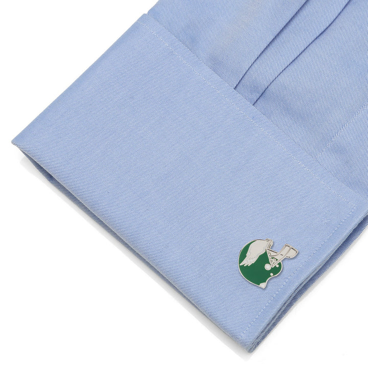 NFL Philadelphia Eagles Retro Helmet Cufflinks in a green and white helmet shape on a light blue dress shirt cuff.