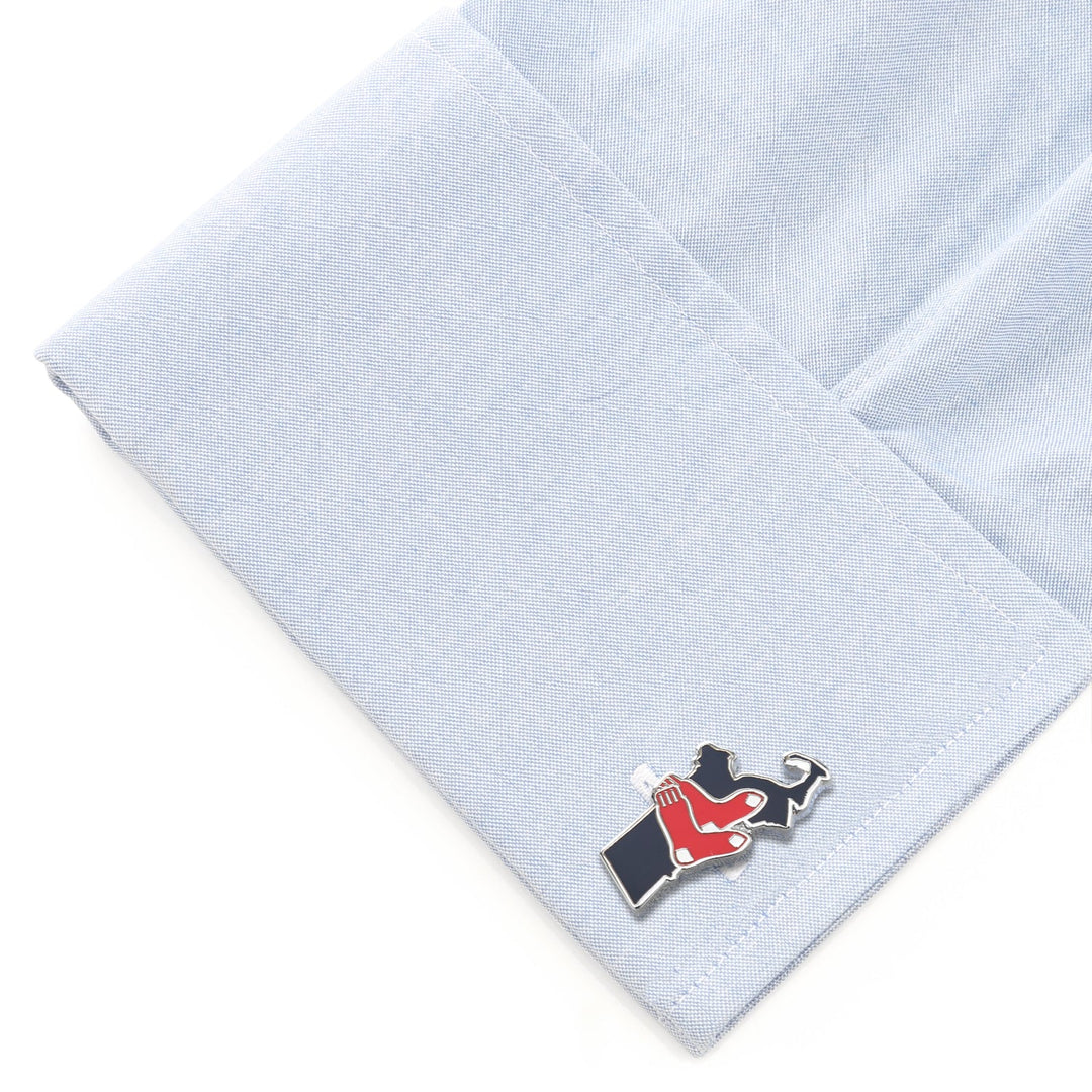 MLB Boston Red Sox State Shaped Cufflinks in the shape of Massachusetts with a red sock logo attached to a light blue dress shirt cuff.