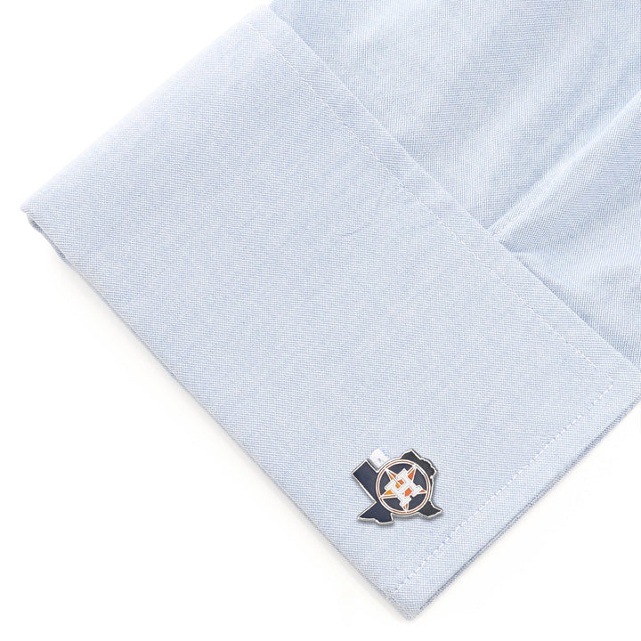 MLB Houston Astros State Shaped Cufflinks shaped like the state of Texas, attached to a light blue shirt cuff.