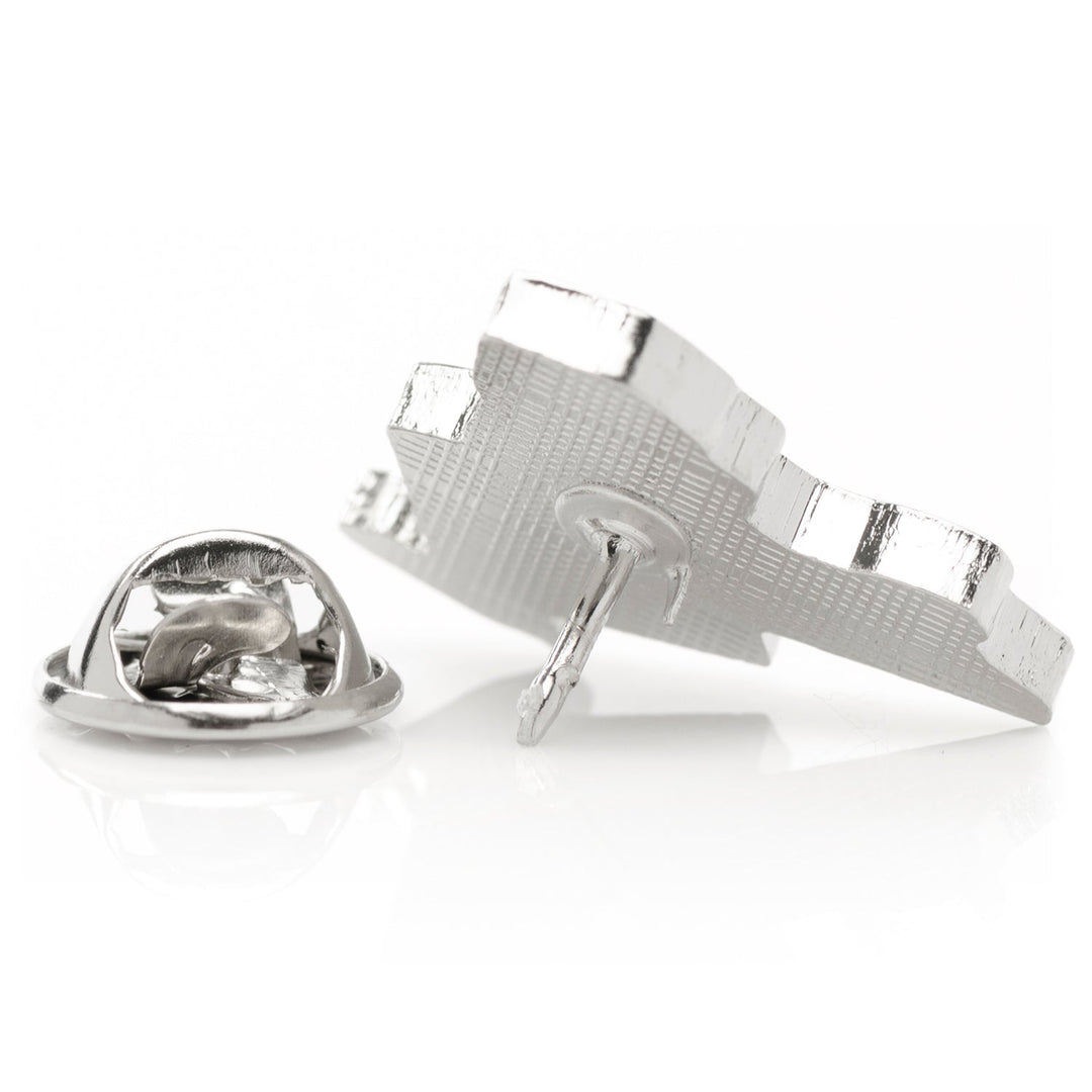 Back view of a silver NFL New York Giants State Shaped Lapel Pin showing the post and a detached clutch fastener.