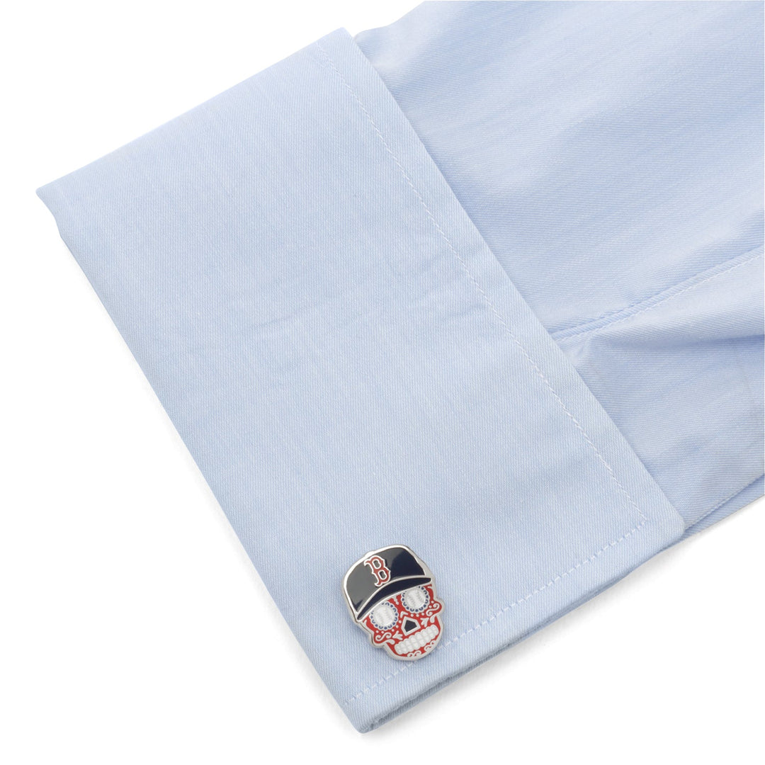 MLB Boston Red Sox Sugar Skull Cufflinks featuring a sugar skull wearing a baseball cap with a letter B on a light blue shirt cuff.