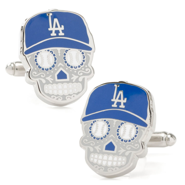 MLB LA Dodgers Sugar Skull Cufflinks featuring silver skulls with blue baseball caps, white “LA” logos, and baseballs as eye sockets.