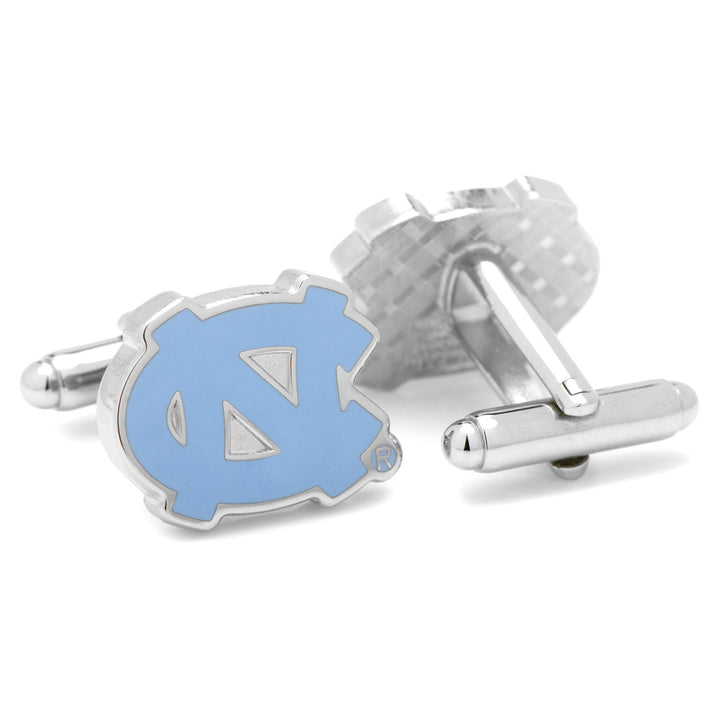 Two silver-toned NCAA University of North Carolina Tar Heels cufflinks featuring the light blue logo.