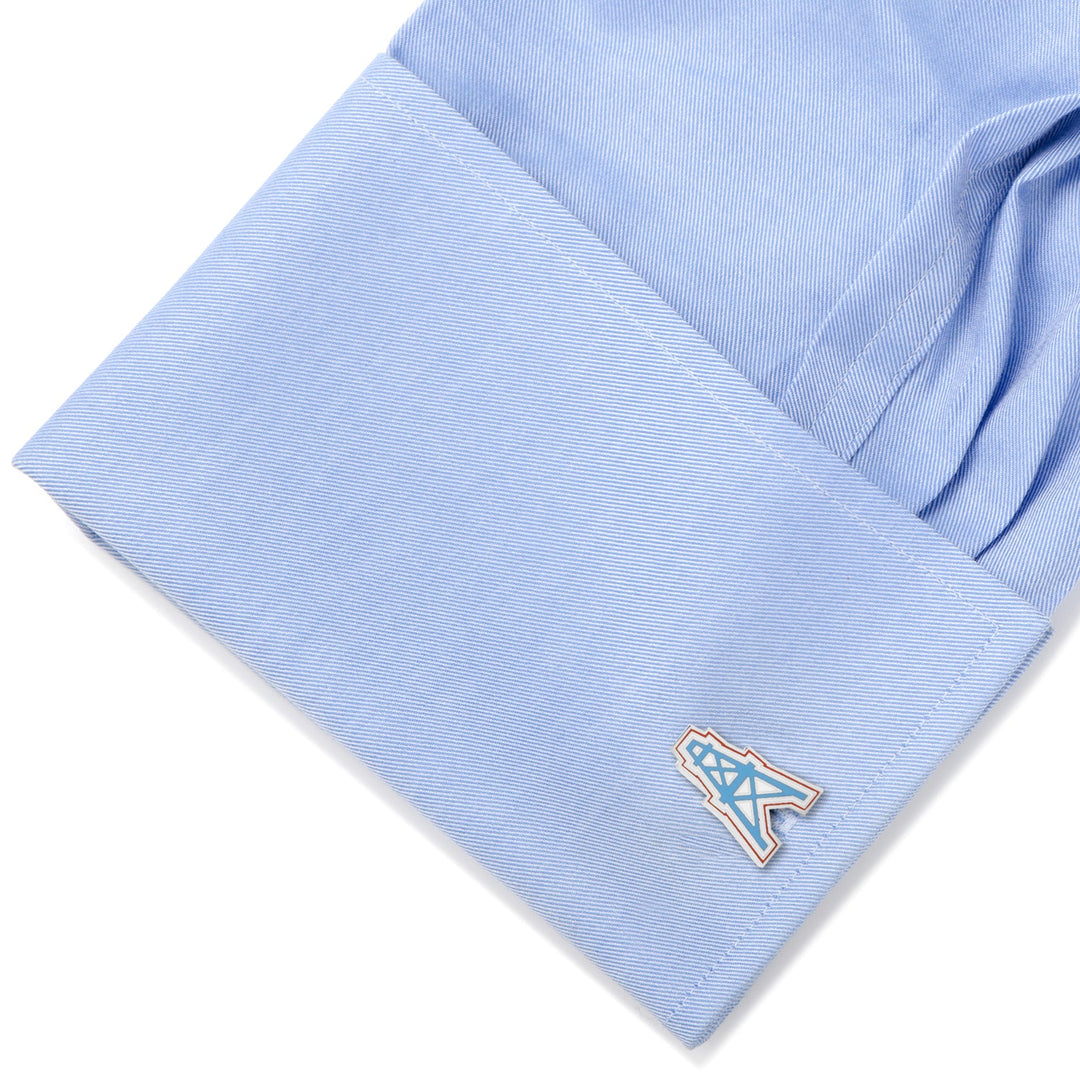 A blue shirt cuff featuring NFL Houston Oilers Vintage Cufflinks.