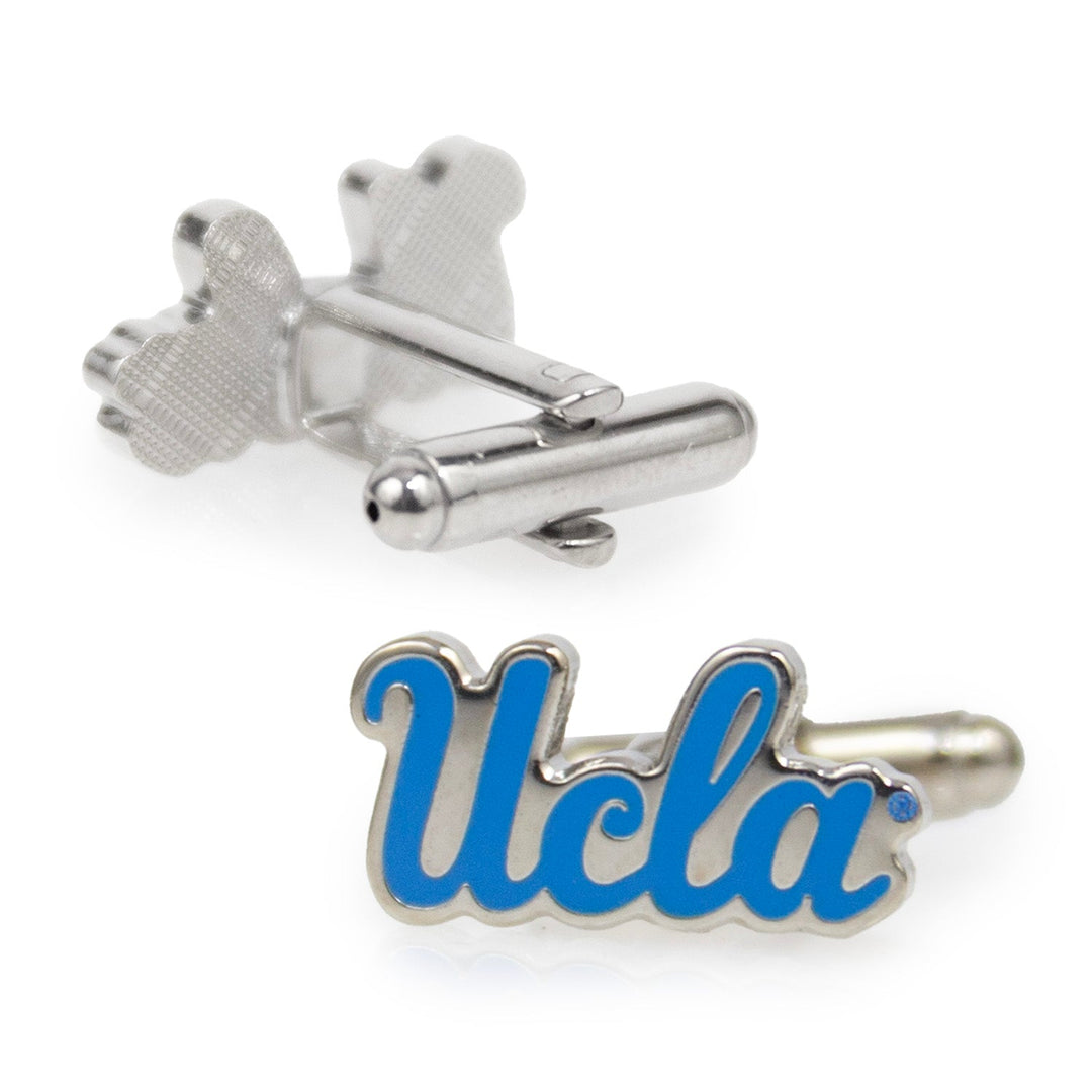 A pair of silver NCAA UCLA Bruins Cufflinks featuring the word “Ucla” in blue script lettering.