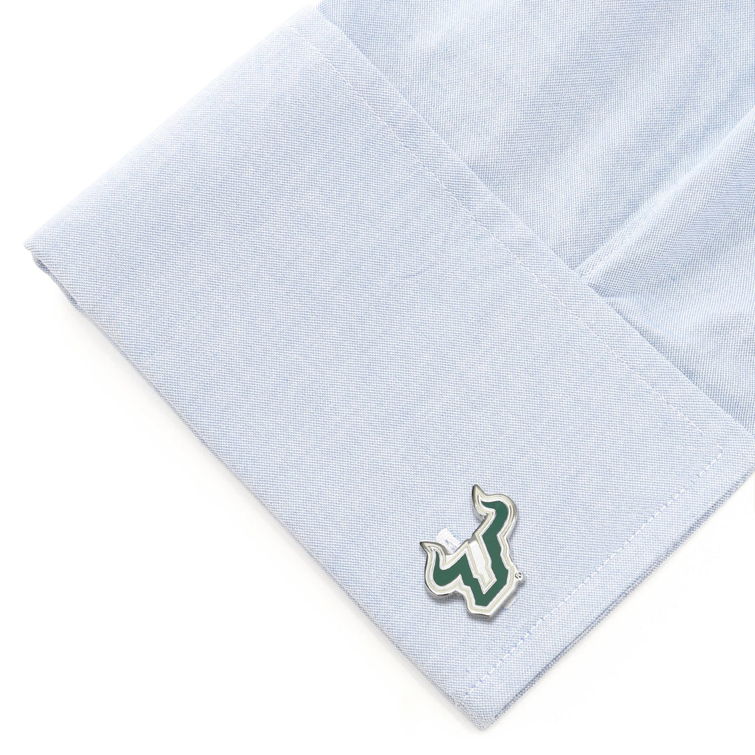 Silver NCAA University of South Florida Cufflinks featuring the bull logo on a light blue dress shirt cuff.