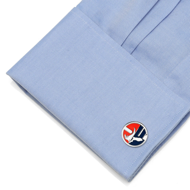 NCAA Florida Gators Throwback Cufflinks featuring a round silver-rimmed design with an alligator mascot on a blue, white, and red background, fastened to a light blue French cuff.