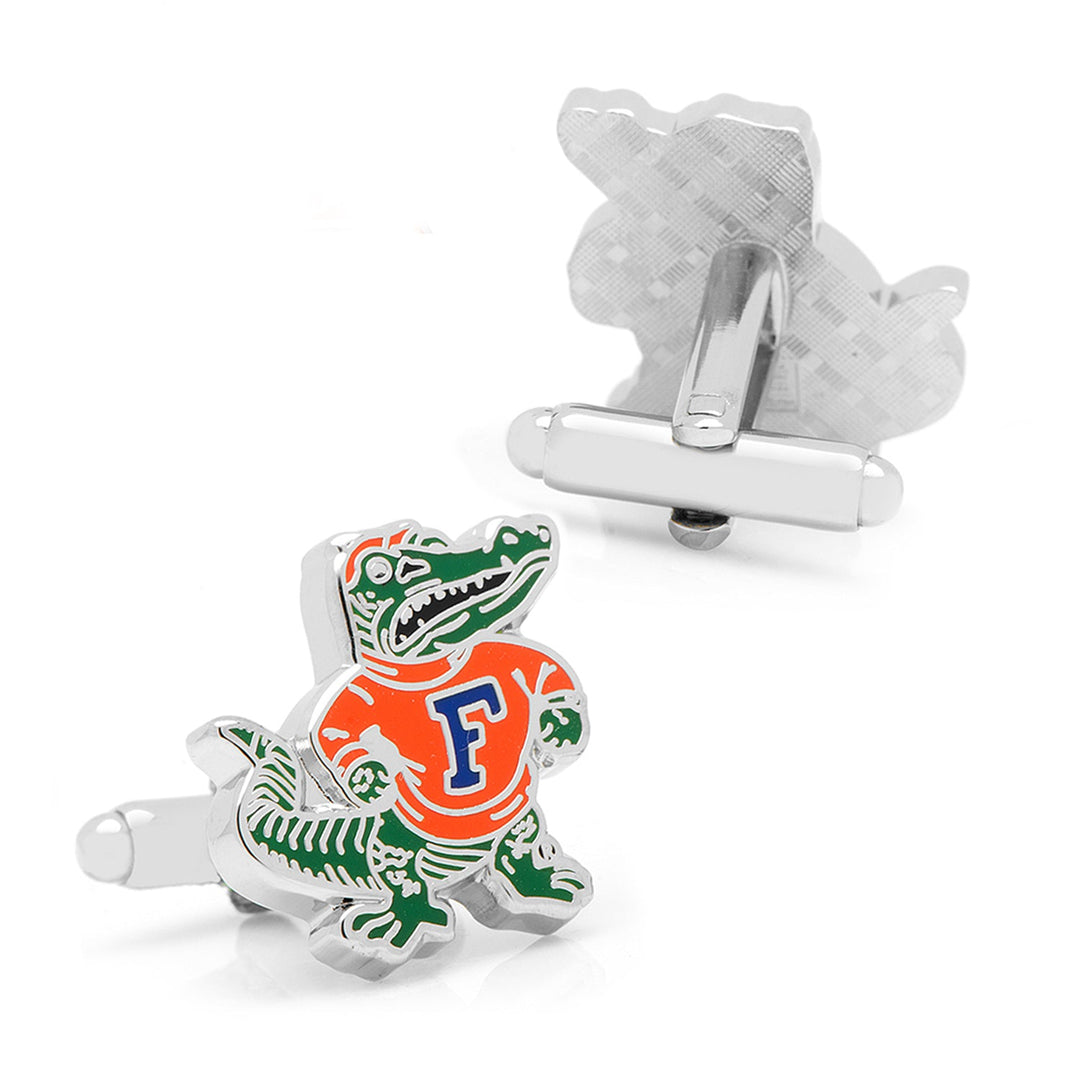 NCAA University of Florida Throwback cufflinks, silver-tone with a green alligator mascot wearing an orange shirt and a blue “F.”