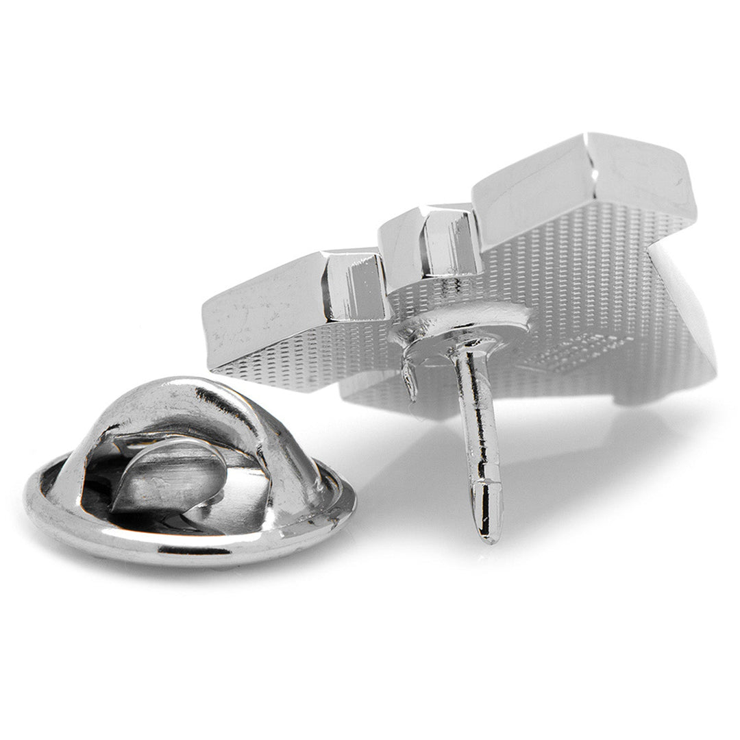 The metallic back of an NCAA West Virginia Mountaineers Lapel Pin featuring a post and a removable clutch backing.