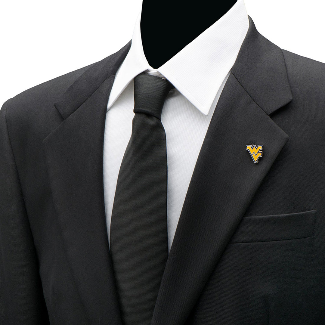 A gold and blue NCAA West Virginia Mountaineers Lapel Pin shaped like the “WV” logo attached to the lapel of a black suit jacket.